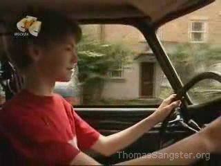 Thomas driving his car